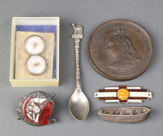 Siege of Paris 1870-1871, a pair of gilt metal studs marked Brioch Dynastique containing fragments of bread, a white metal rowing boat marked 'Grace Darling', a Soviet Order of the Red Banner enamel badge, a Victorian bronze medallion marked 'First Order of Merit' an enamelled St Christopher plaque 2 1/2" x 1/2"