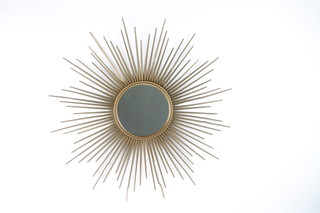 A 1960's Chaty Vallauris Sunburst Mirror, circa 1960, 33"