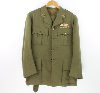 A WWII Rhodesia General service corps Captains Service Dress tunic and trousers with RAF pilots wings, medal ribbons together with a Royal Air Force peak cap, the interior  labelled 5005300 SAC Smith P R 615 Squ. R.AUX. F 1955 (no cap badge)