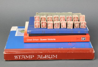 A stock book of various used GB stamps, George VI - Elizabeth II, a book of various Colonial and world stamps from Elizabeth II and a book of various world stamps, a 1903 Indian postal guide, a Stanley Gibbons catalogue Vol I, 16th edition and a collection of various penny reds (unmounted)