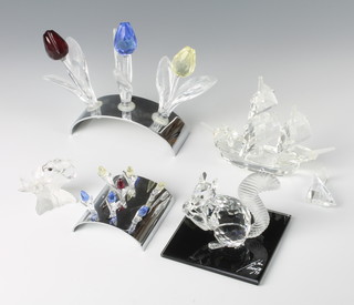 A Swarovski Crystal figure of a squirrel eating a nut 2 1/2", a do. group of 3 flowers on  a chromium stand, model of a galleon, bee and a chromium stand with 7 (ex 9) flowers 

