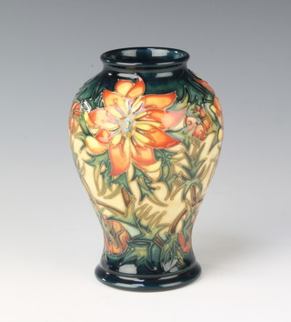 A Moorcroft oviform vase decorated with flowers by Beverley Wilkes 17.10.98 6"