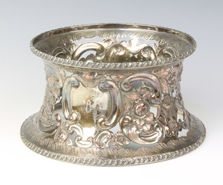 A 19th Century plated pierced and repousse potato ring decorated flowers and scrolls, 8 1/2"