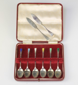 A set of 6 silver and enamel coffee spoons, Birmingham 1951 and two silver butter knives
