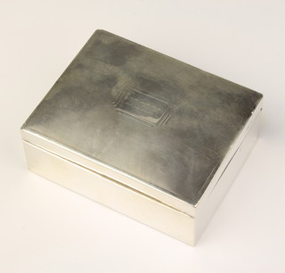A rectangular engine turned cigarette box, Birmingham 1937, 4 1/2" x 3" x 1 3/4"