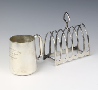 A plated 7 bar toast rack and a plated mug