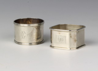 A silver engine turned napkin ring, Birmingham 1986 and 1 other, 59 grams