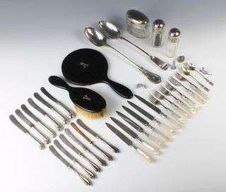 A plated gravy spoon and minor plated items