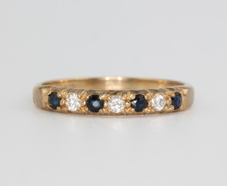 A yellow gold sapphire and diamond half eternity ring size P 1/2