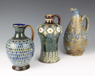 Three Doulton Lambeth salt glazed jugs, 9 1/2"h, 9"h and 8"h