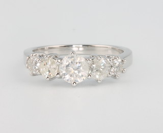 An 18ct white gold 5 stone diamond ring, approx 1.75ct, size N