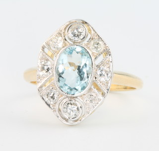 An 18ct yellow gold and aquamarine and diamond Art Deco style ring, the centre oval stone approx 1.0ct surrounded by brilliant cut diamonds approx 0.5ct, size M 1/2