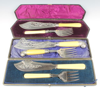 A pair of Victorian plated chased and pierced fish servers, two cased plated pairs