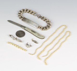 A silver identity bracelet, a ditto fruit knife and minor jewellery