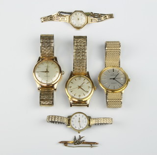 A lady's 9ct yellow gold Vertex wristwatch, 4 other wristwatches and a gold bar brooch