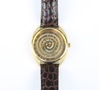 A gentleman's gilt cased Zoughaib diamond set wristwatch on a leather strap