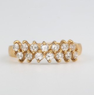 An 18ct yellow gold diamond ring size N