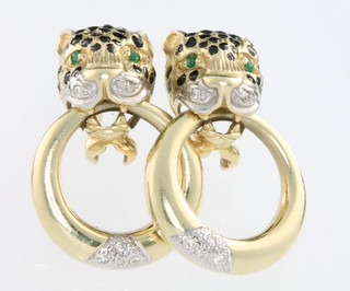 A pair of 18ct yellow gold gem set Cartier style leopard ear hoops 10.1 grams
