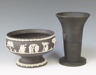 A Wedgwood black Jasperware waisted vase with rams head handles, the base marked R1589 8"h together with a Wedgwood black jasperware pedestal bowl 8" d