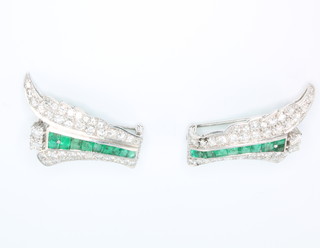A pair of white gold emerald and diamond Art Deco style brooches, 38mm x 25mm