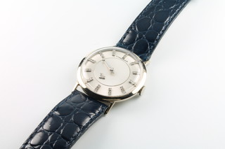 A gentleman's Longines 14ct white gold cased mystery dress watch with diamond set numbers on a leather strap, 32mm