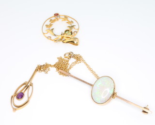 Two yellow gold gem set pendants and a ditto opal brooch