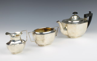 A 3 piece octagonal silver tea set, London 1930, gross weight 963 grams