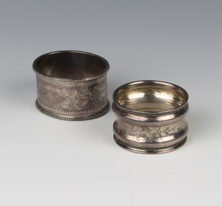 A Victorian silver napkin ring, London 1887, and one other, 54 grams