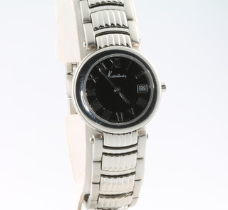 A lady's steel cased Kutchinsky calendar wristwatch on a steel strap, complete with box