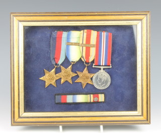 Four WW2 medals, 1939-45 star, Atlantic Star with France and Germany bar, Africa star with North AFrica 1942/3 bar and British war medal