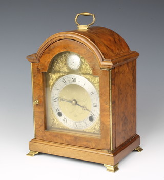 Elliott, a Queen Anne style chiming bracket clock with 4 1/2" gilt dial, silver chapter ring contained in a walnut case