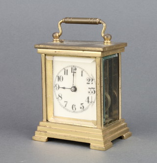 Waterbury Clock Co., a striking carriage clock with rectangular enamelled dial and Arabic numerals contained in a  stepped gilt case 4" x 3" x 2 1/2" 