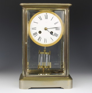 A 19th Century French striking 4 glass clock, the enamelled dial with Roman numerals, having a twin mercurial pendulum contained in a gilt case, 10" x 5 1/2" x 4" 