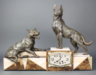 An Art Deco 3 colour marble mantel clock with diamond shaped dial, Arabic numerals and surmounted by 2 spelter figures of greyhounds