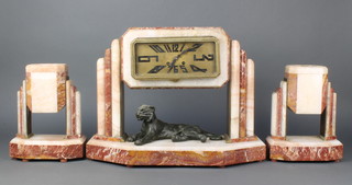 An Art Deco 3 piece three coloured clock garniture, the striking mantel clock with gilt dial and Arabic numerals in the form of a portico above a recumbent lion 