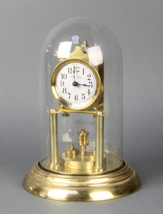 A 400 day clock with silvered dial, arabic numerals contained in a gilt case complete with glass dome 10 1/2"h