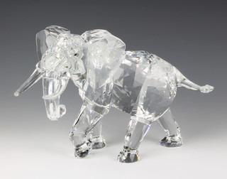 A Swarovski figure of an elephant , code 854407/9100000034, designed by Heinz Tabbertshot No 445/10000, contained in a fitted Swarovski suitcase