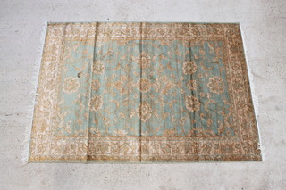 A green and gold ground Belgian cotton "Ziegler" style rug 89" x 63" 
