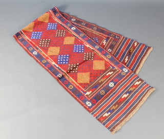 A red blue and brown ground Meshwani runner with 24" diamonds within a multi-row border 100" x 20" 