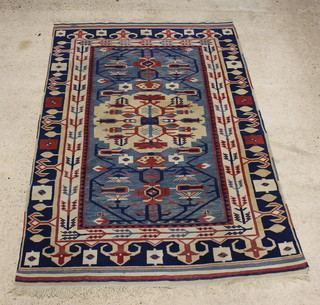 A blue and white ground Caucasian style rug with central medallion 97" x 65 1/2"