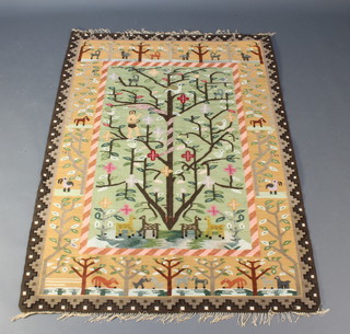 A Kilim rug decorated Tree of Life with animals and figures 62" x 47"