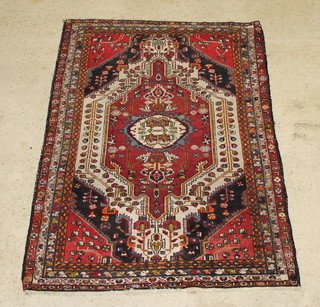 A tan and white ground Malayer rug 77"x 57", some wear