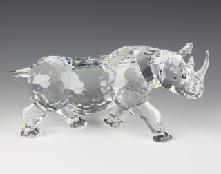 A limited edition Swarovski figure of a Rhinoceros, designed by Anton Hosinger No 8126/10000 12" , contained in a fitted Swarovski suitcase