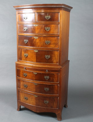 A Georgian style mahogany bow front chest on chest, the upper section with moulded and dentil cornice fitted 2 short and 3 long drawers, the base fitted a brushing slide above 3 long drawers above splayed bracket feet 60"h x 28"w d 19 1/2"d