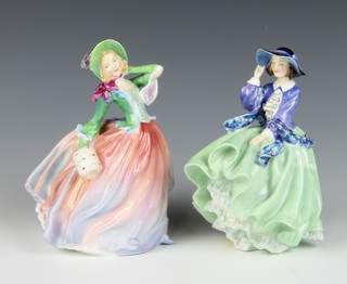 A Royal Doulton figure Top O'the Hill HN1833 19cm together with 1 other Autumn Breezes HN1911 20cm 
