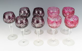 5 purple cut glass long stemmed hock glasses together with 5 hock glasses with pink bowls (1 with damage to foot) 