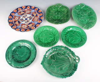 A 19th Century Japanese Imari porcelain plate with panelled decoration together with 3 19th Century green glazed twin handled leaf plates, 1 other dish and 3 leaf plates