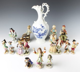 A Sitzendorf style figure of a gentleman with basket of flowers 15cm together with a 7 piece porcelain monkey band (all with damage), a Capodimonte figure of a seated boy 16cm,  a Limoges ewer 30cm