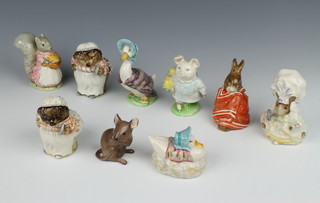 A collection of Beswick Beatrix Potter figures including Poorly Peter Rabbit 10cm, Jemima Puddle Duck 10cm, Mrs Tiggywinkle 9cm, Little Pig Robinson 10cm, Lady Mouse 10cm, Goody Tiptoes 9cm, Mrs Tiggywinkle 10cm, Puddle Duck by John Beswick 6cm and a Beswick mouse 7cm 