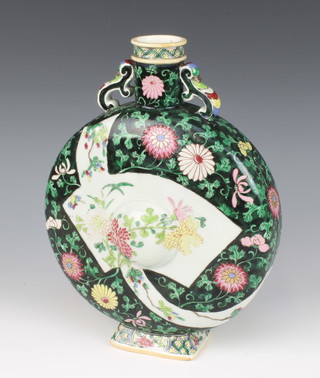 An 18th Century style Chinese moon flask the black ground decorated with peony 28cm 